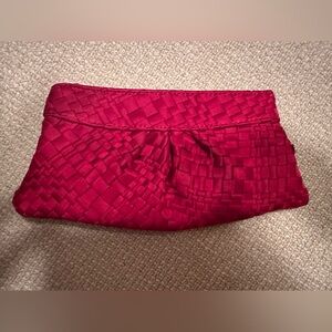 red woven Laura merkin clutch